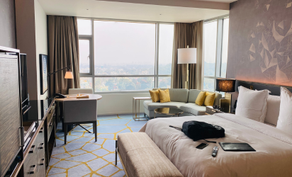 Professional commercial mattress cleaning and sanitising service in a Sydney hotel room by Tuft & Weave.