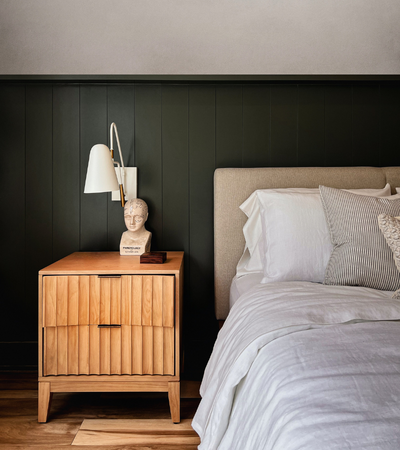 Sydney mattress cleaning by Tuft & Weave — serene bedroom with crisp white bedding and timber side table