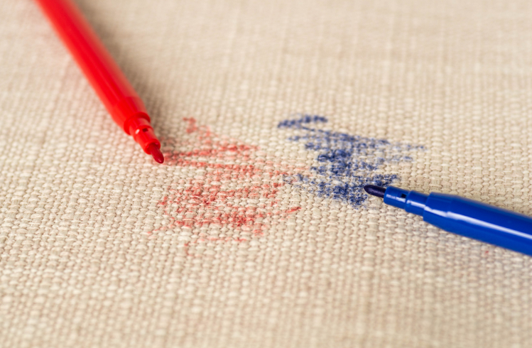 Red and blue ink stains on cream carpet – ink stain cleaning Sydney
