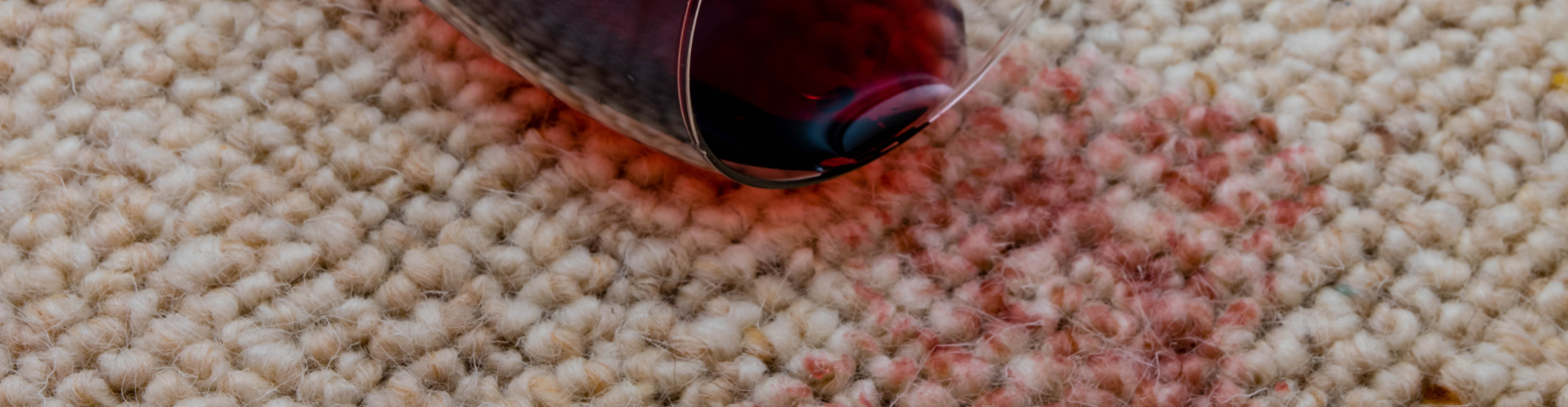 Red wine spilled on cream carpet