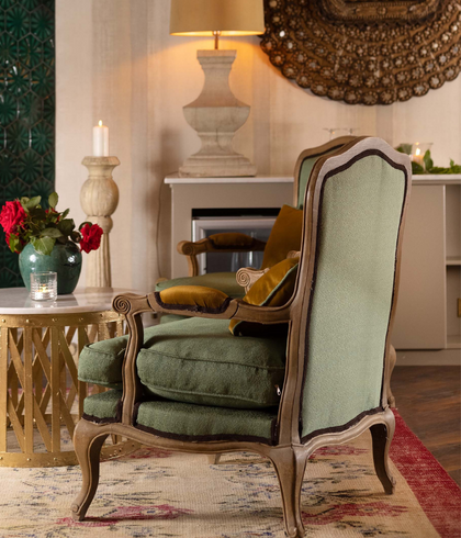 Green linen armchair protected with advanced fibre and fabric protection treatment in Sydney home