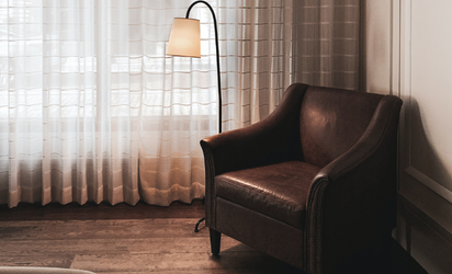 Brown leather armcair