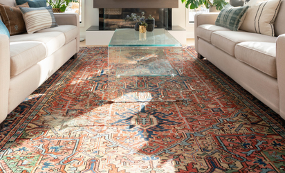 Rug cleaning Sydney – Persian rug with cream sofas in living room